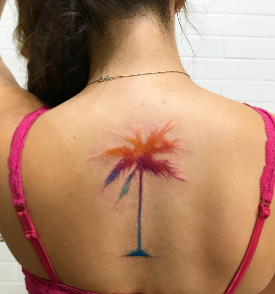 Colorful palm tree tattoo by Junior Lopes