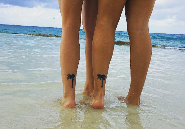Matching palm tree tattoos via Audrey Rose