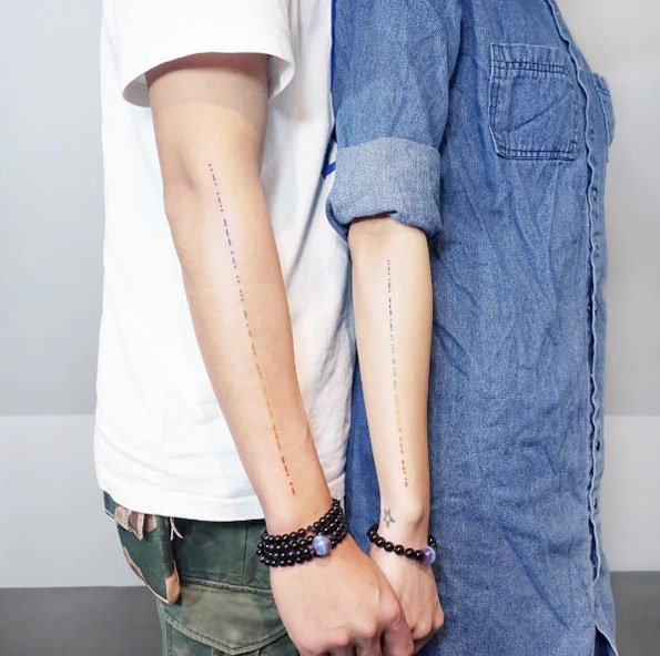 Rainbow morse code couple tattoos by Tattooist IDA