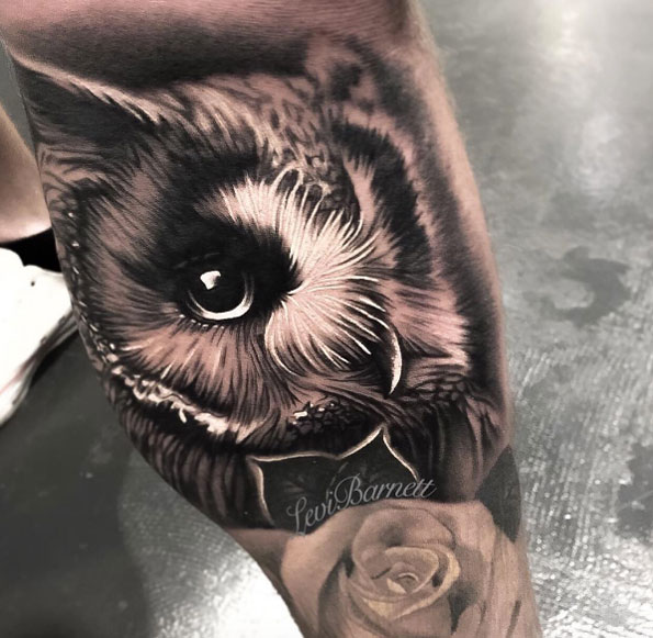 Close up owl tattoo by Levi Barnett