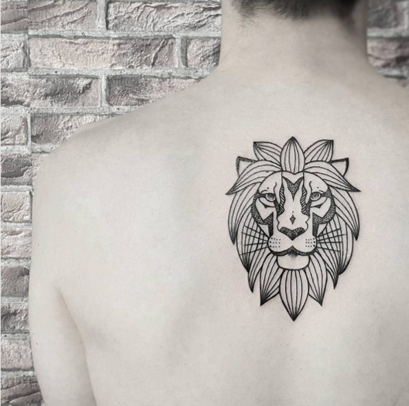 Minimalistic lion tattoo on back by ISA