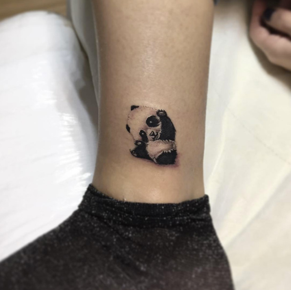 Baby panda tattoo by Caglar