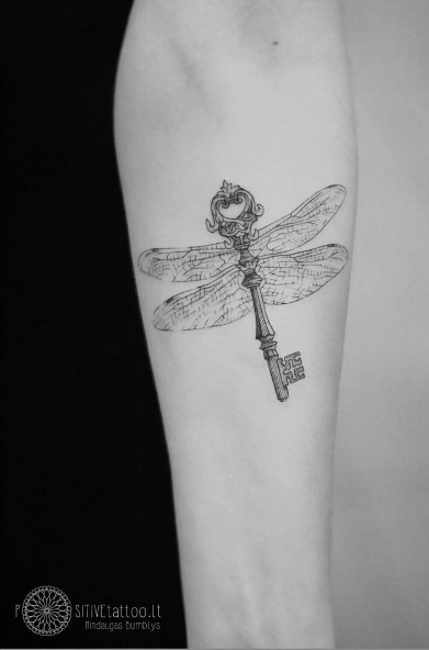 Skeleton key tattoo with dragonfly wings by Mindaugas Bumblys