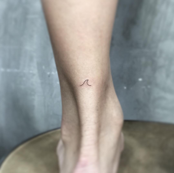 Itty-bitty wave on ankle by Lonewolf Studio