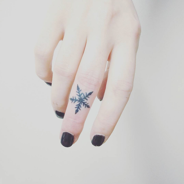 Snowflake finger tattoo by Jonas Willy