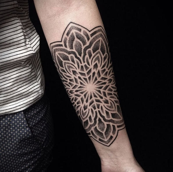 Mandala flower on forearm by Ivan Hack