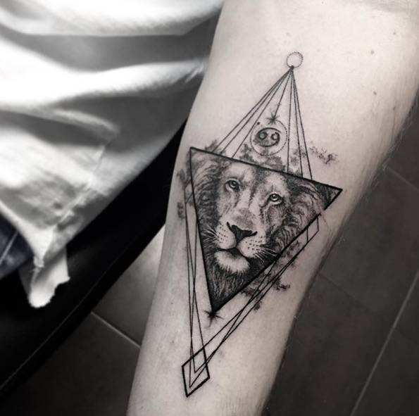 Geometric lion tattoo by Sara Reichardt