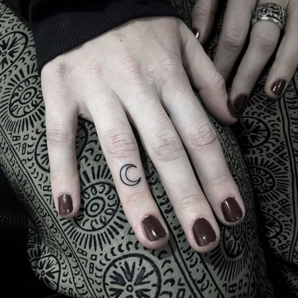 Crescent moon finger tattoo by Nalea Kim