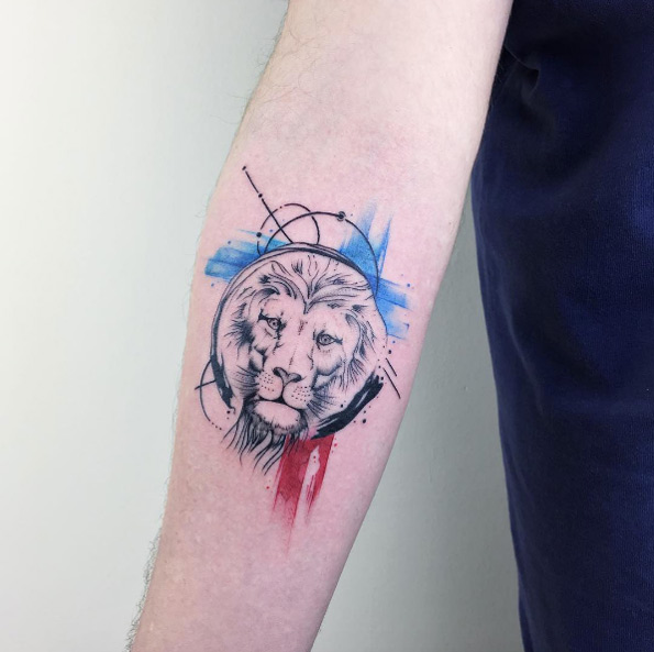 Lion tattoo on forearm by Baris Yesilbas