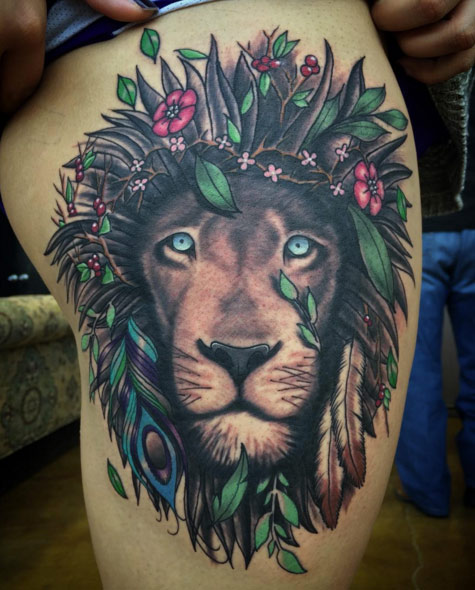 Naturalistic lion tattoo by Eric Ryan