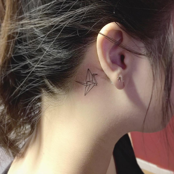 Origami crane tattoo by Jay Shin
