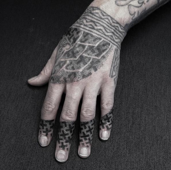 Finger pattern tattoos by Helsinki