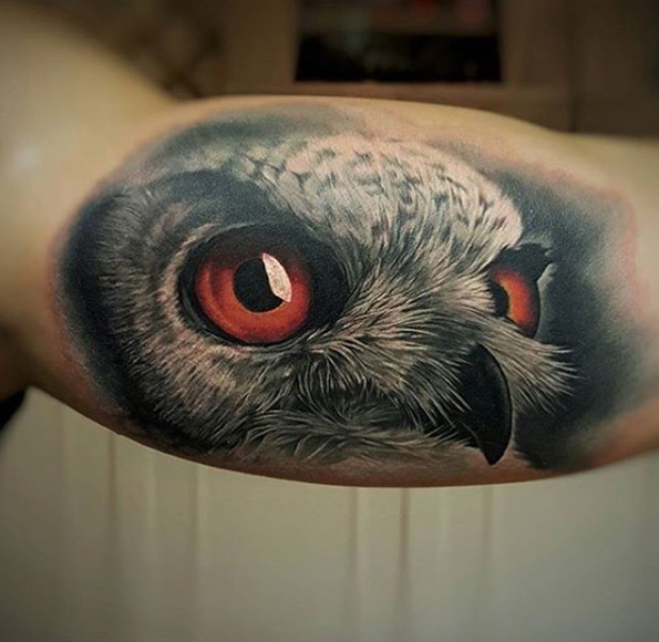 Red-eyed owl tattoo by Csorsz Peter