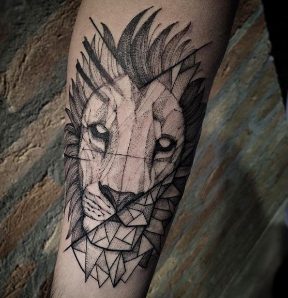 Geometric lion tattoo by Estudio de Tattoo