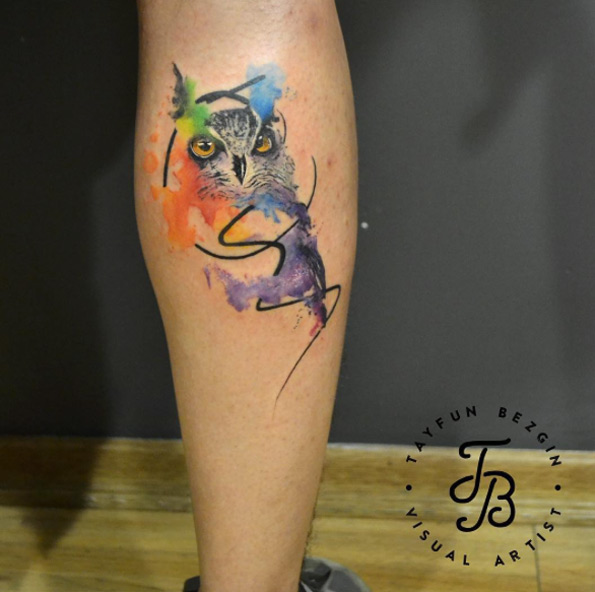 Abstract watercolor owl tattoo by Tayfun Bezgin
