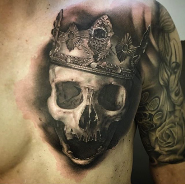 Skull and crown tattoo by David Rinklin