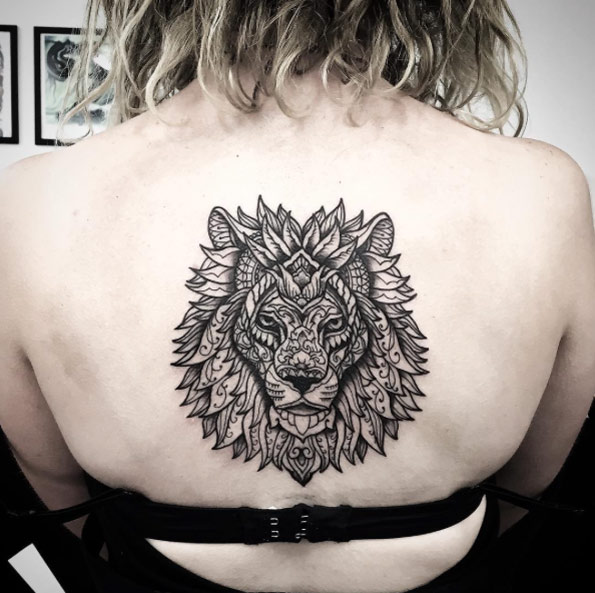 Ornate lion tattoo by Ishi Neve