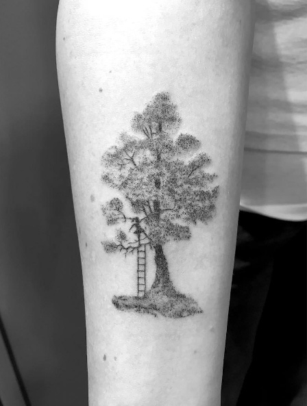 Tree climber tattoo by Daniel Winter