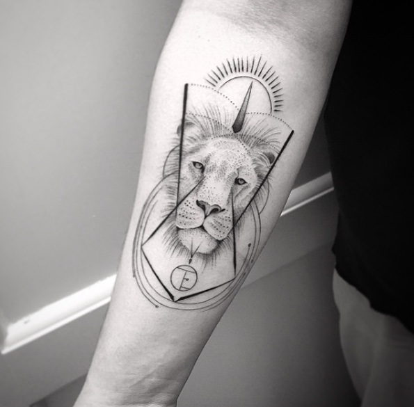 Lion tattoo on forearm by Balazs Bercsenyi