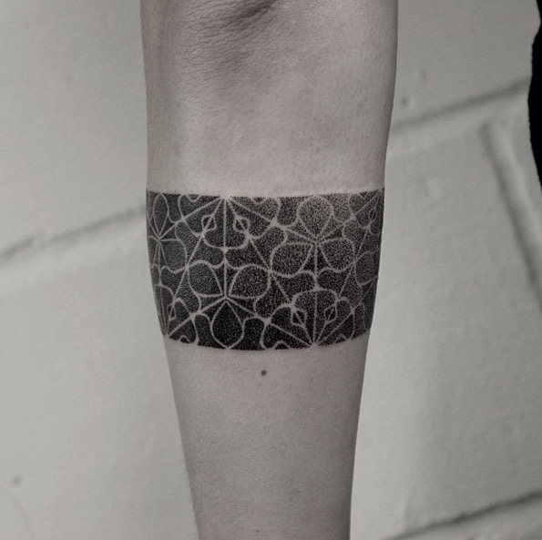 Hand poked dotwork band by Oliver Whiting