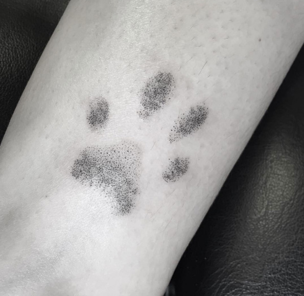 Dotwork paw print tattoo by Victoria Woon