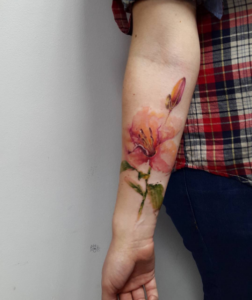 Watercolor flower on forearm by Anton