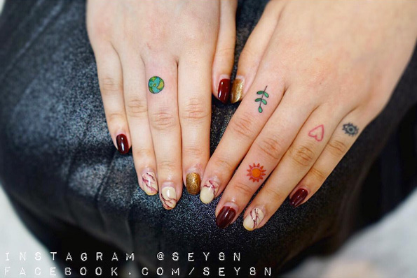 Colorful finger tattoos by Seyoon Gim