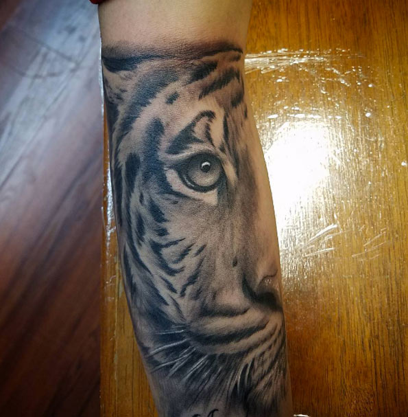 Elegant tiger tattoo by Freez Rivera