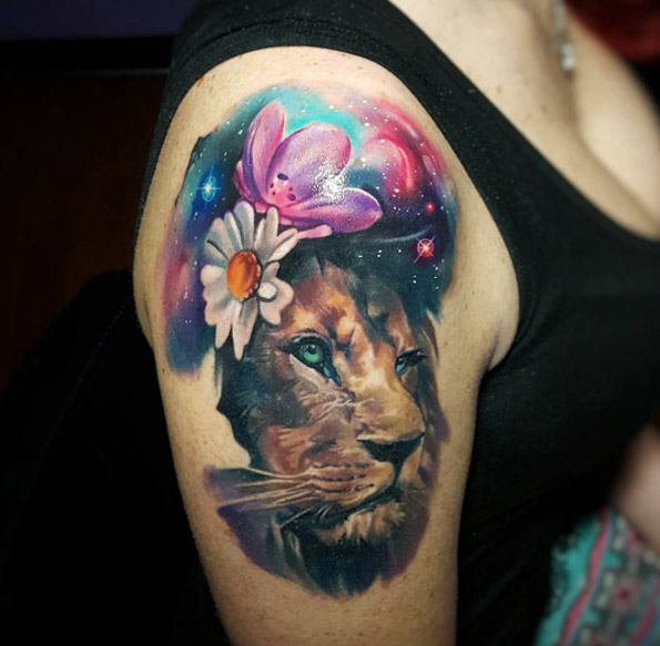 Cosmic lion tattoo by Tyler Malek
