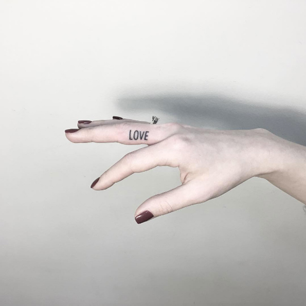 Handpoked 'LOVE' tattoo by Shpadyreva Julia