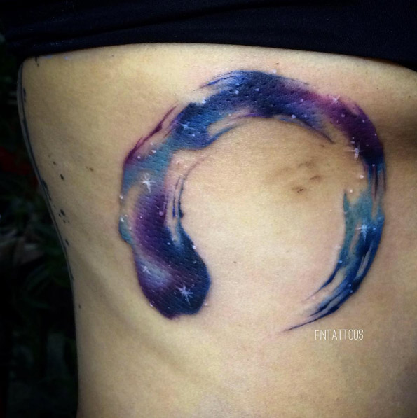 Galactic brush stroke tattoo by Fin Tattoos