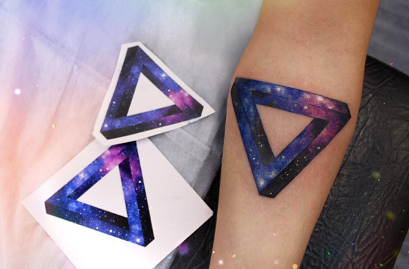 Space style impossible triangle tattoo by Anna Yershova