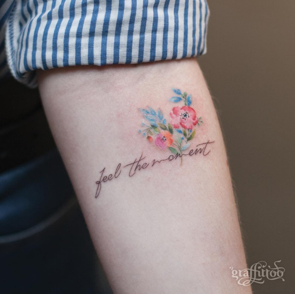 'Feel the moment' floral tattoo by Tattooist River