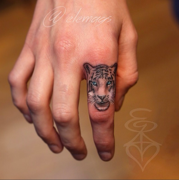 Tiger tattoo on finger by EL-E