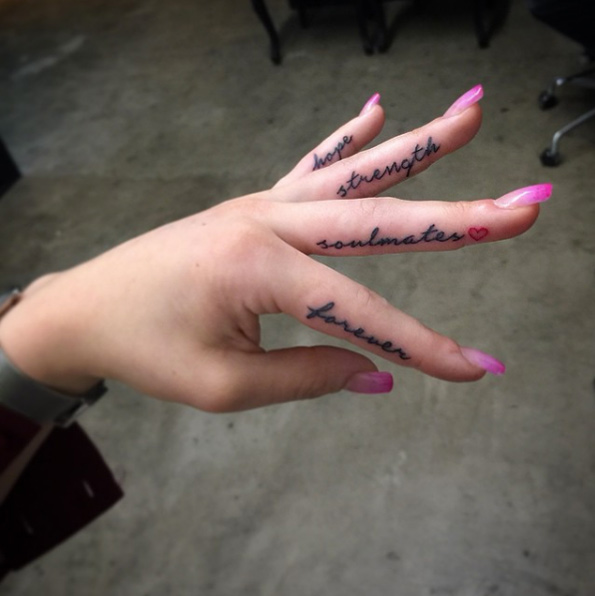 Cursive finger tattoos by EL-E