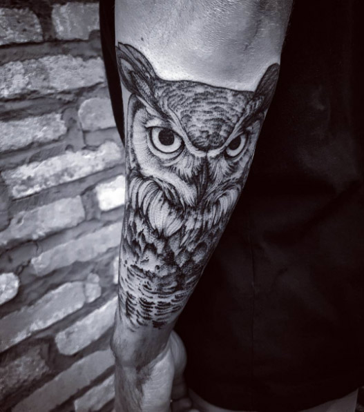 Forearm owl tattoo by Felipe Kross