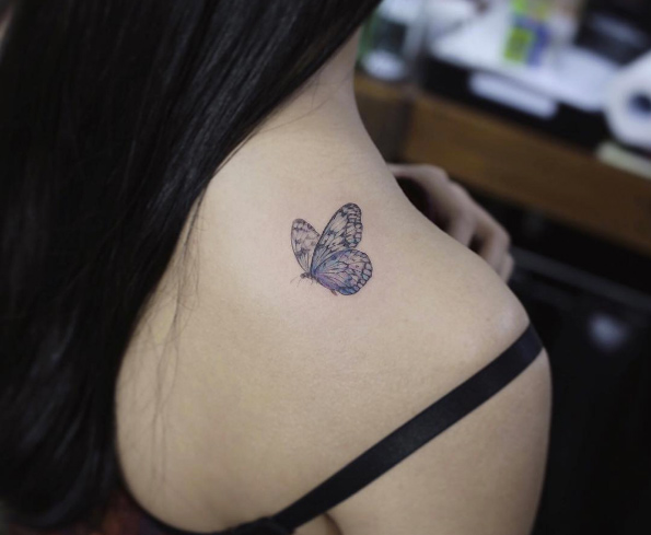 Beautiful little butterfly tattoo by Flower