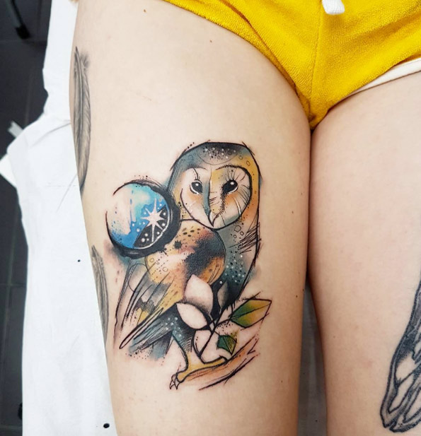 Playful watercolor owl tattoo by Josie Sexton