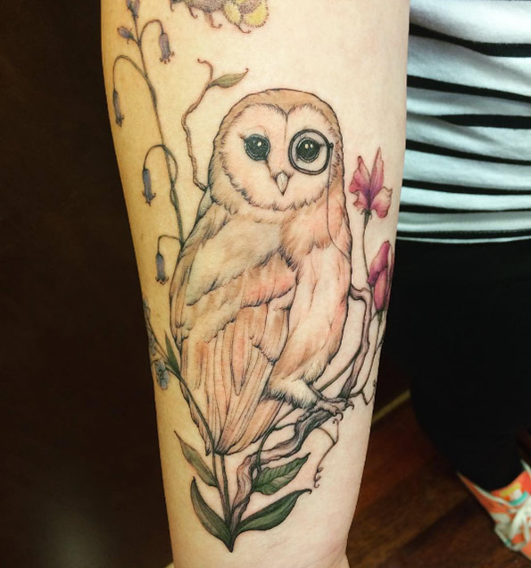 Monocle-wearing owl tattoo by Katy Hayward