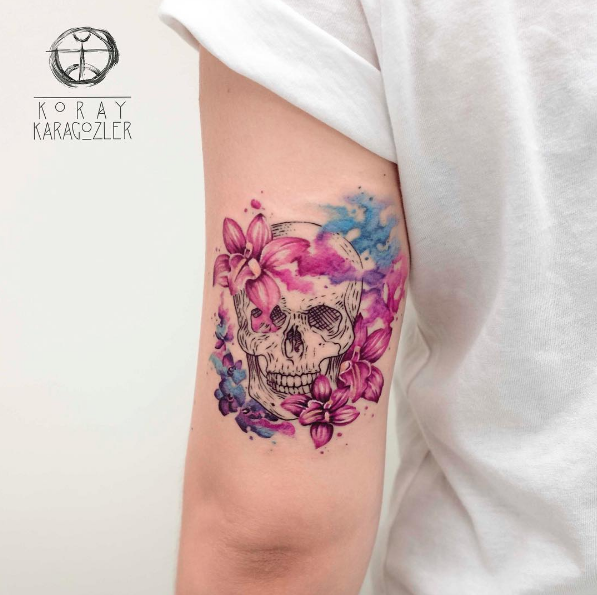 Floral watercolor skull by Koray Karagozler