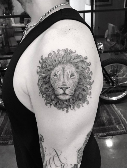 Curly mane lion tattoo by Doctor Woo