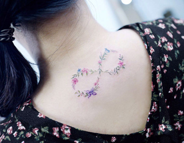 Floral infinity symbol by Tattooist Banul