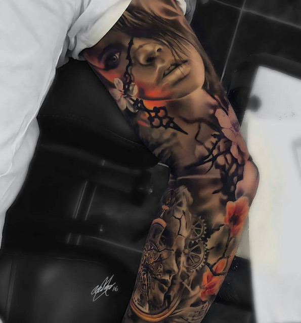 Surreal sleeve tattoo by Gary Mossman