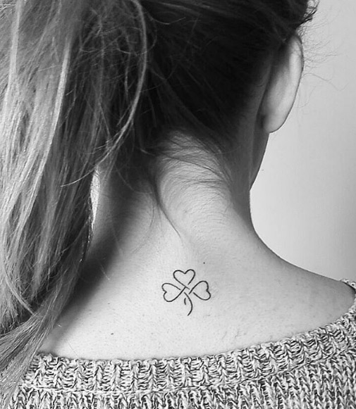 Tiny shamrock tattoo via Maike