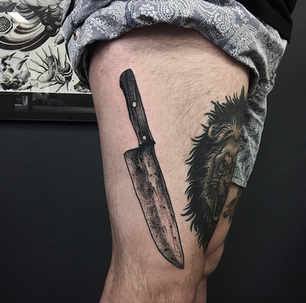 Weathered knife tattoo by Pari Corbitt
