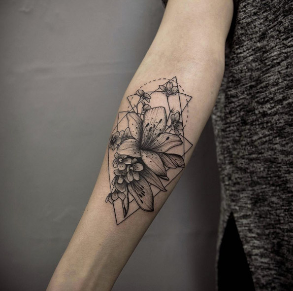 Blackwork floral forearm piece by Damo