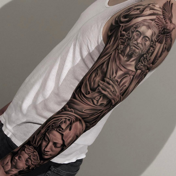 Religion full sleeve tattoo by Jun Cha