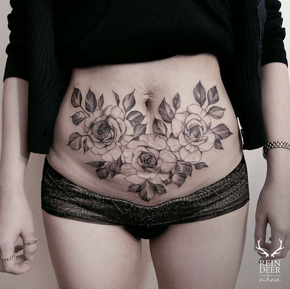 Floral scar-concealing tattoo by Zihwa