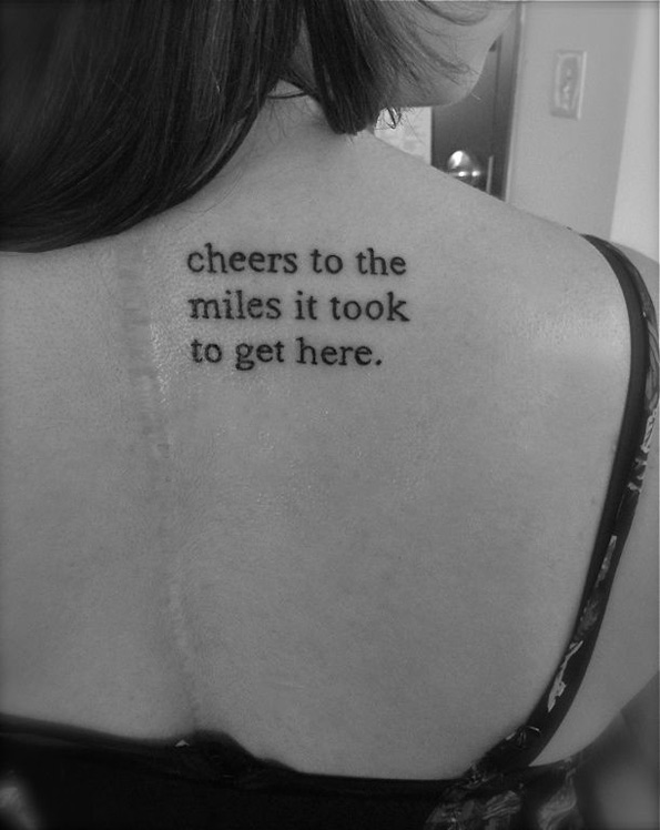 'Cheers to the miles it took to get here' tattoo