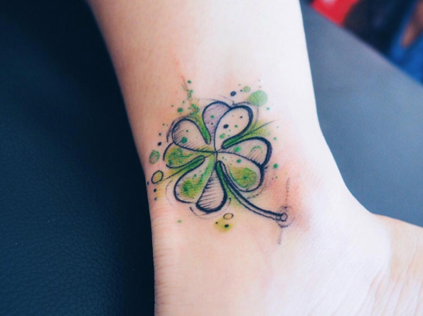 Watercolor four leaf clover by Baris Yesilbas